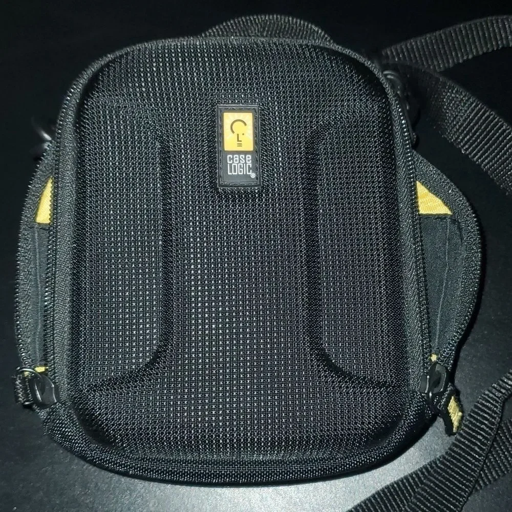 Caselogic case black yellow storage case clean very lightly used preowned vguc